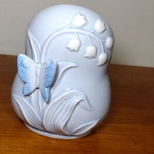 Decorative toothbrush holder.